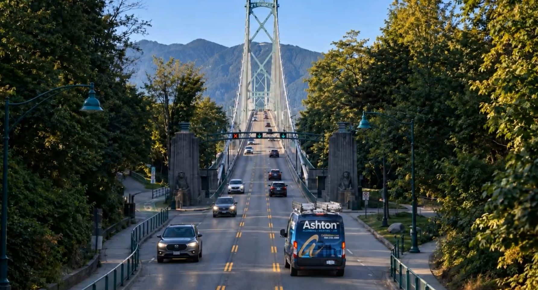 Ashton service van driving across the Lions Gate Bridge in Vancouver