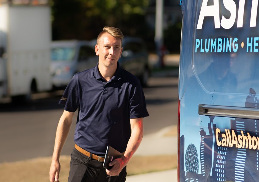 Ashton technician arriving beside a service van