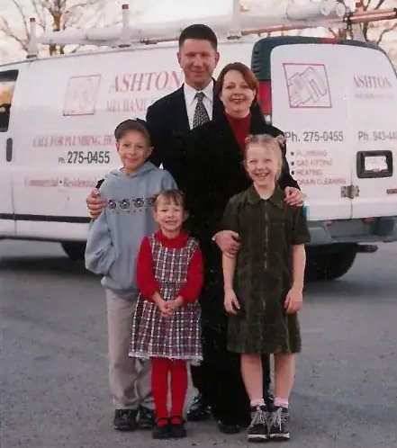 The Ashton family in front of one of the first Ashton service vans